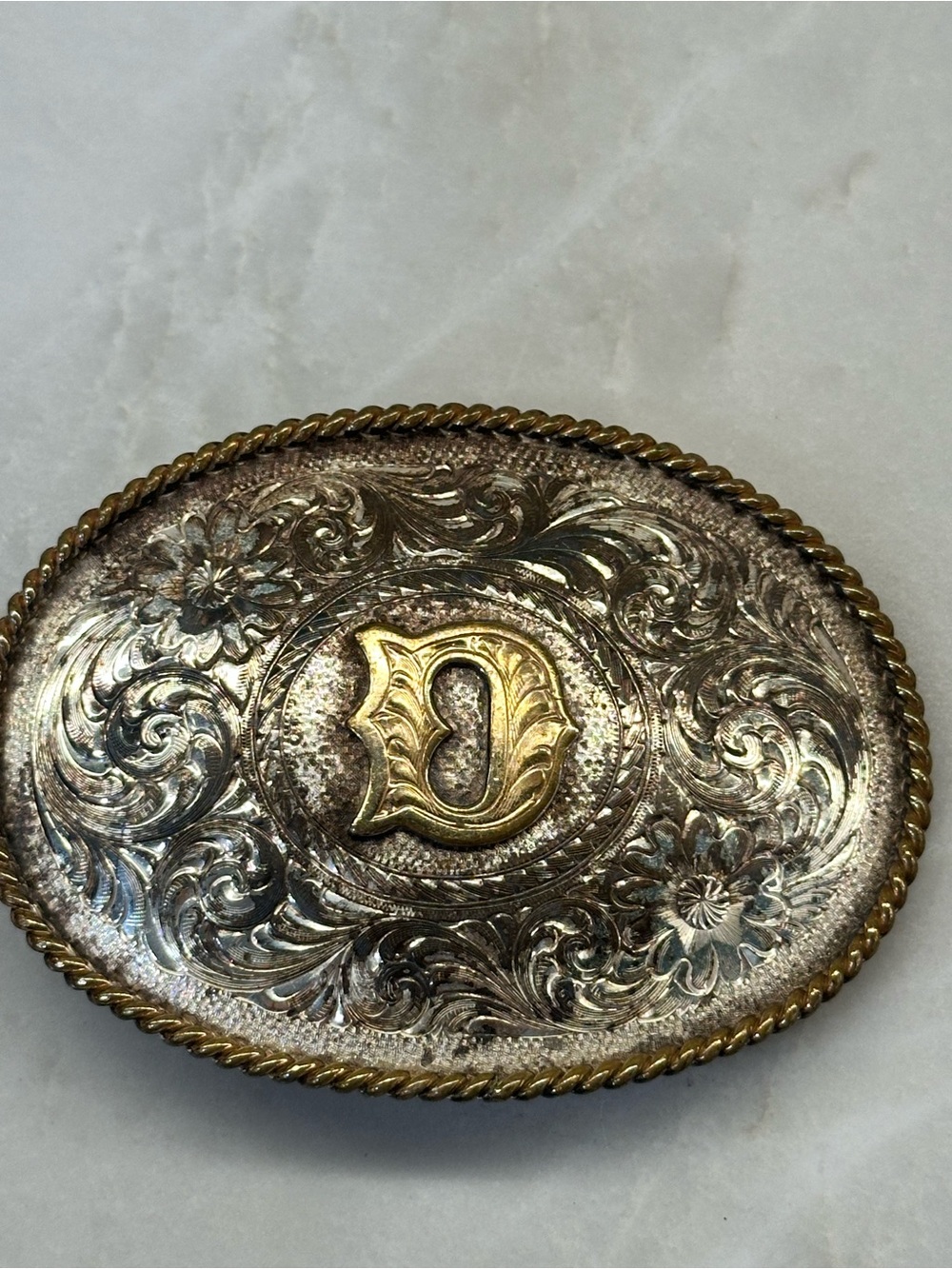 Montana Silversmiths Oval Floral Engraved Belt Buckle with Gold Letter D